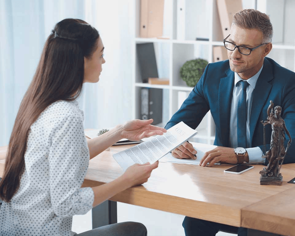 Professional legal consultation and contract review session with an experienced attorney at MI Law.